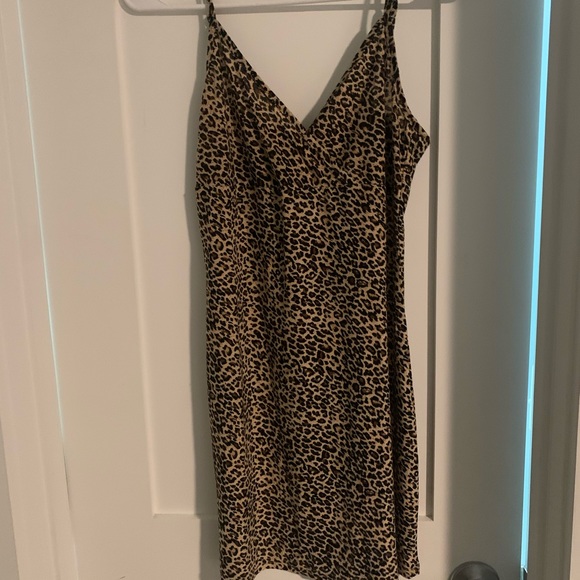Cutest cheetah print mini dress! Adorbs for a date or night out with the girls! - Picture 2 of 3